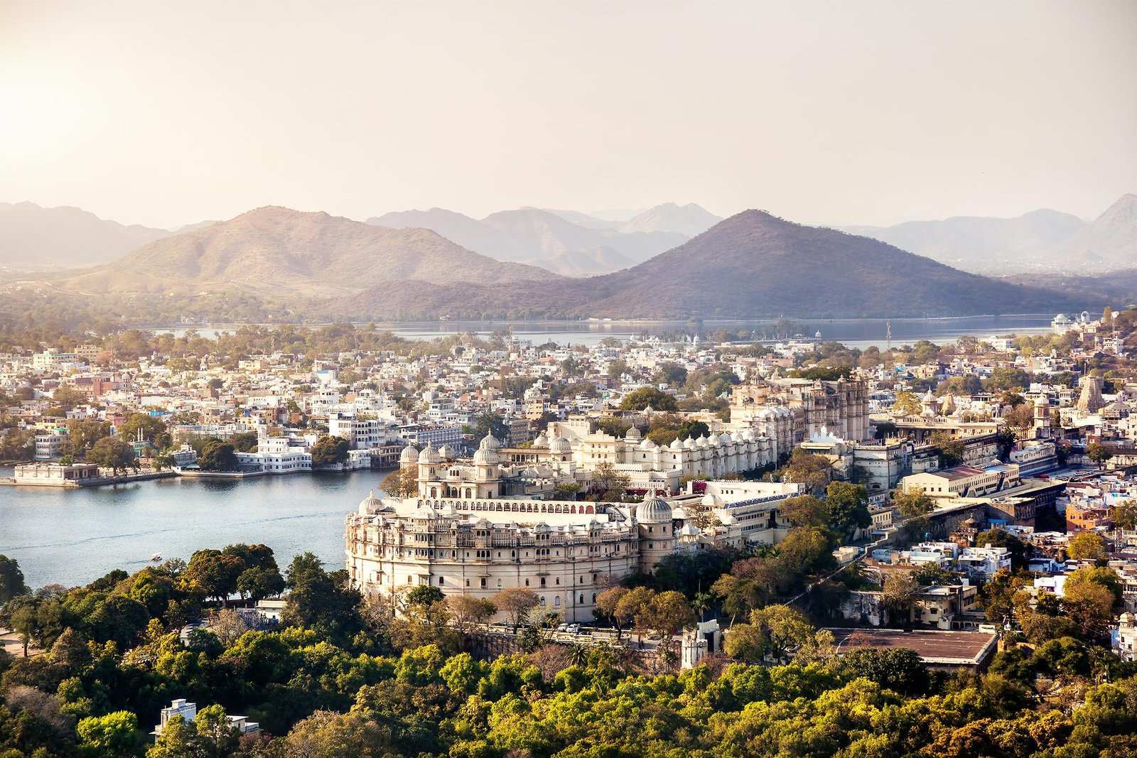 Panoramic view of Udaipur city with Lake Pichola, City Palace and surrounding hills